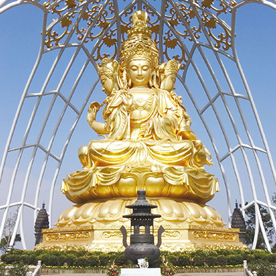 Four-sided Guanyin bronze statue